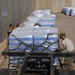 Soldiers in Iraq prepare water for transport