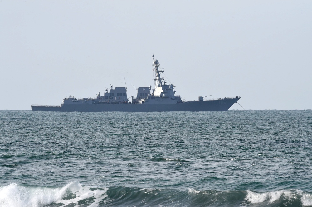 USS Sampson (DDG 102) sits anchored off the coast of southern California