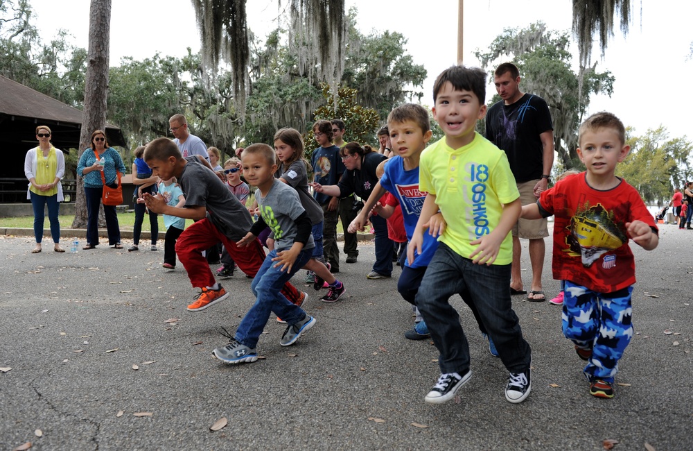 Keesler children celebrate Easter in the Park rain or shine