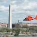 Coast Guard helicopter crew flies above the cherry blossoms