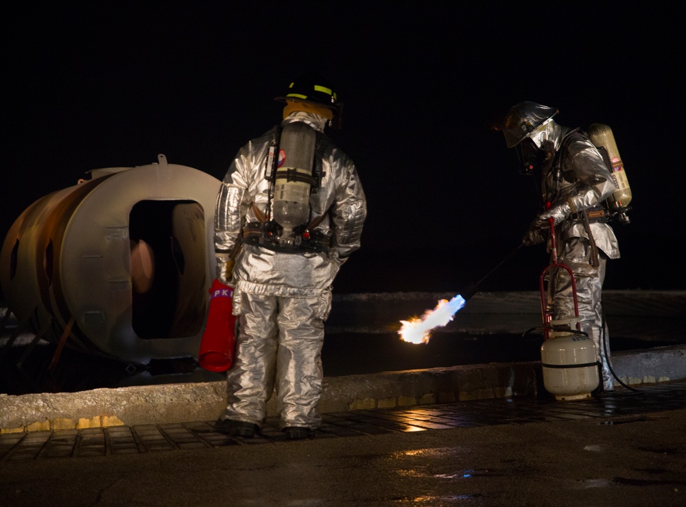 On fire for training: Aircraft Rescue Fire Fighting Marines sharpen skills on Marine Corps Air Station Futenma