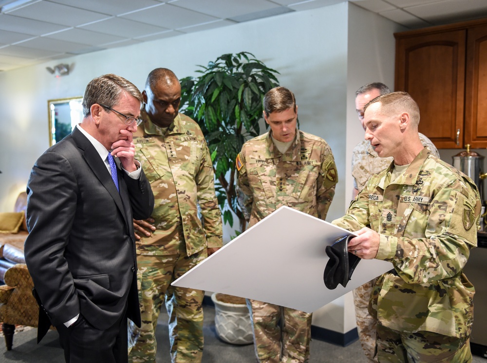 SD,CENTCOM commander and CJCS are briefed before a change-of-command ceremony.