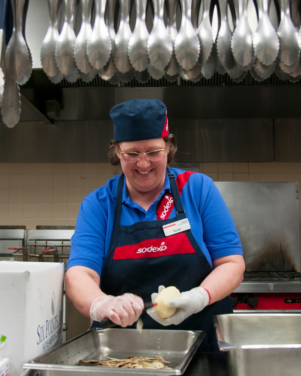 Dining facility civilians prepare meals