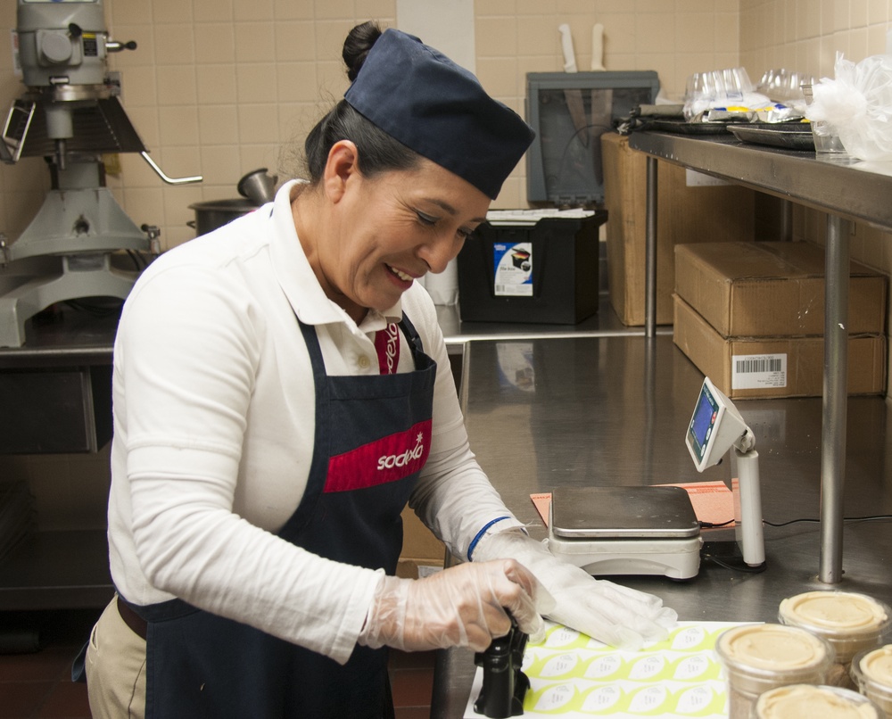 Dining facility civilians prepare meals