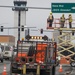 773rd Civil Engineer Squadron Airmen outdated Elmendorf Air Force Base signs with new Joint Base signs in Anchorage