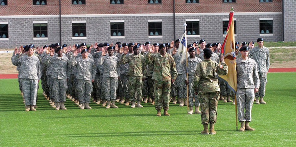 Troops take stand against sexual misconduct at pledge ceremony