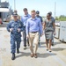 Cdr. Edward Callahan, executive officer, USS Frank Cable (AS 40), gives a Congressional delegation tour in Guam