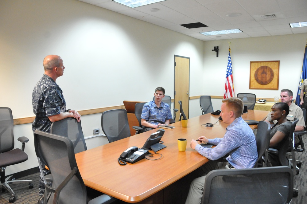 Capt. Grimes, CSS-15, discusses the importance of Guam and the submarine force during a Congressional delegation visit to Guam