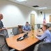 Capt. Grimes, CSS-15, discusses the importance of Guam and the submarine force during a Congressional delegation visit to Guam