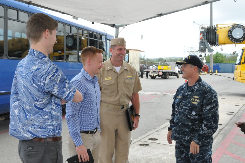 Cmdr. Callahan, XO, USS Frank Cable, welcomes a Congressional delegation for a tour in port Guam