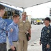 Cmdr. Callahan, XO, USS Frank Cable, welcomes a Congressional delegation for a tour in port Guam