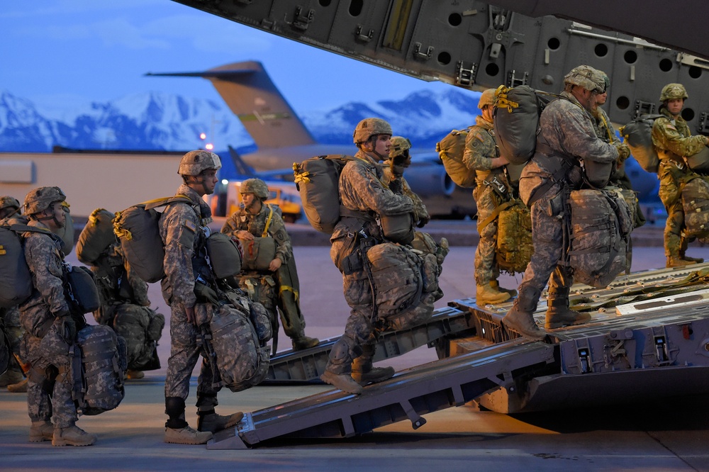 Alaskan paratroopers prepare to jump