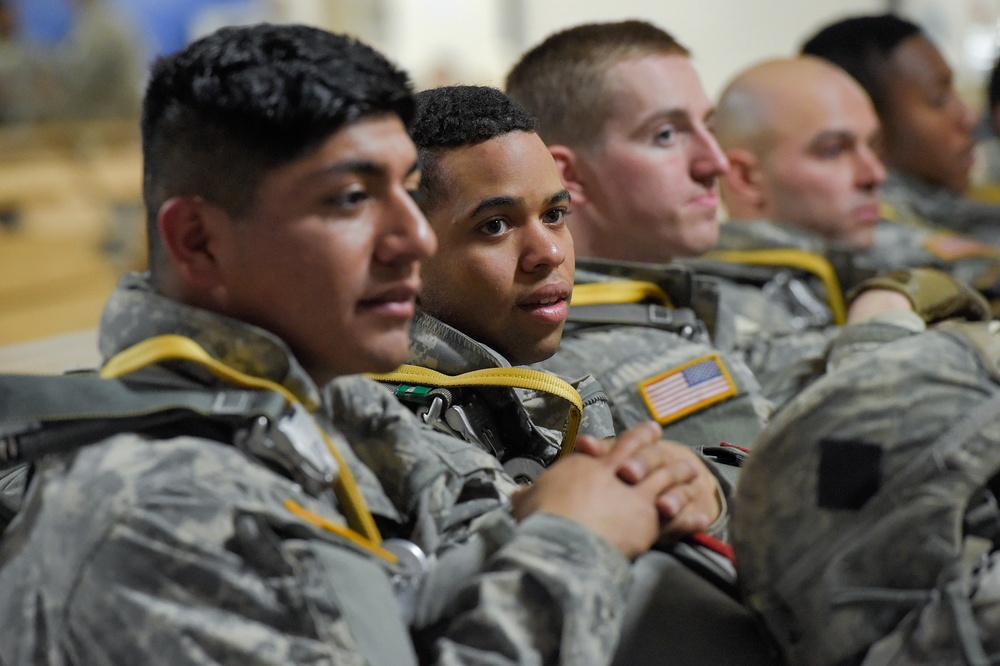 Alaskan paratroopers prepare to jump