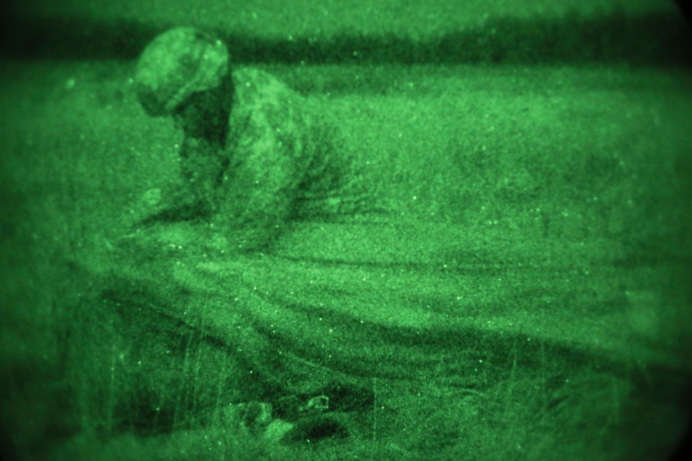 Alaskan paratroopers conduct night jump operations