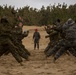 U.S. Marines and R.O.K. Marines conduct warm up exercises