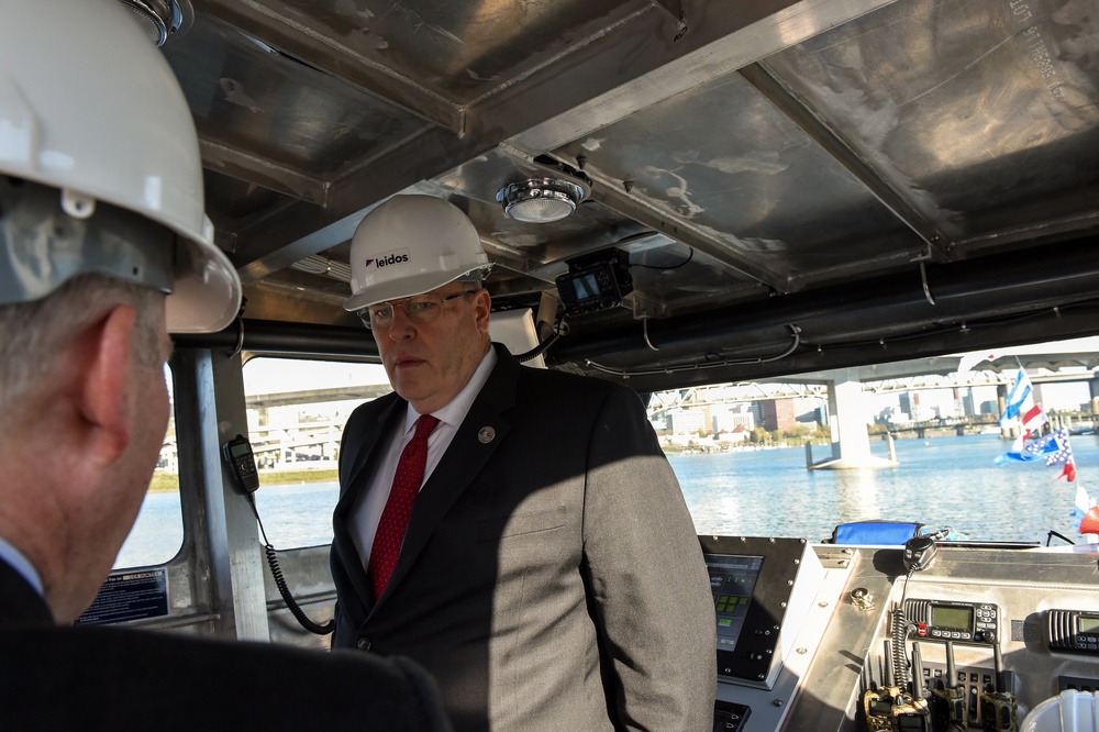 DSD tours the wheelhouse before the DARPA christening ceremony.