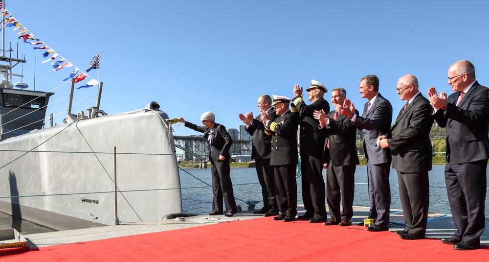 DSD celebrates during DARPA christening ceremony.