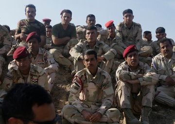 Iraqi soldiers assigned to Nineveh Operations Command practice patrol movements