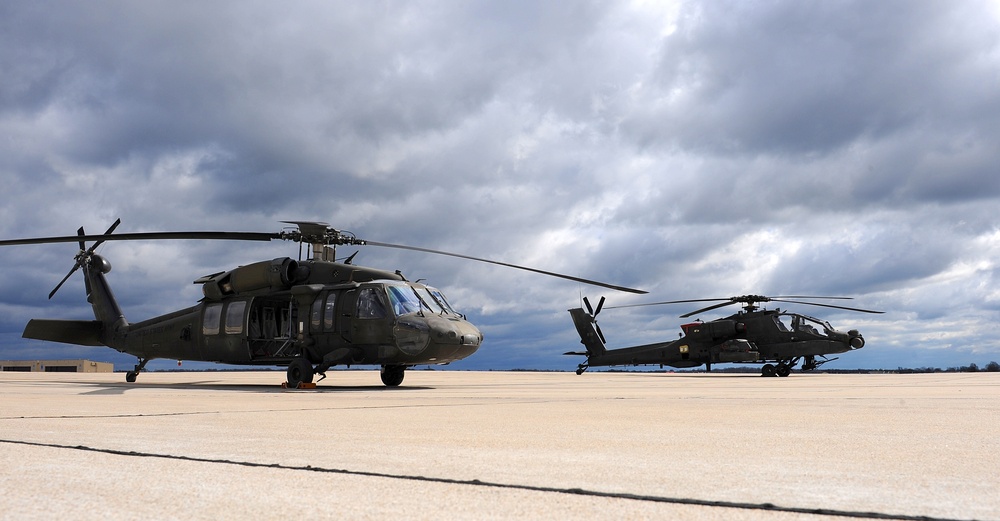 Apache and Black Hawk on Flight line.