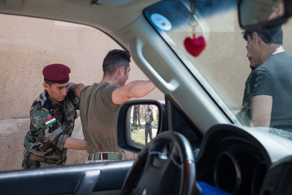 Zeravani officers take class on vehicle inspection at check points
