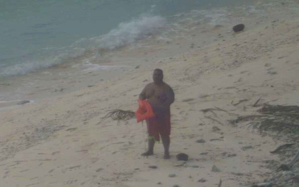 castaways rescued after spelling 'help' with palm leaves on remote island