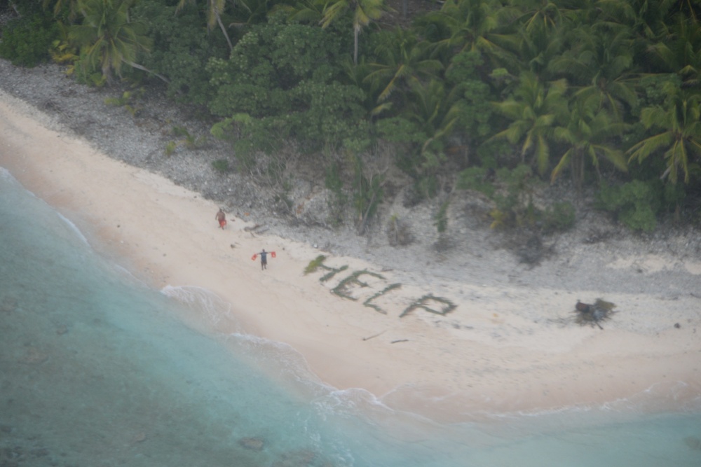 castaways rescued after spelling 'help' with palm leaves on remote island