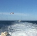 Coast Guard rescues 4 men after boat takes on water