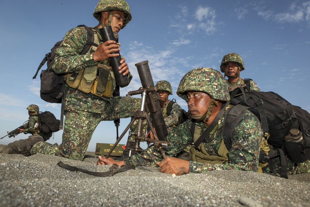 U.S. and Philippine service members participate in an amphibious capabilities demonstration during Balikatan 2016