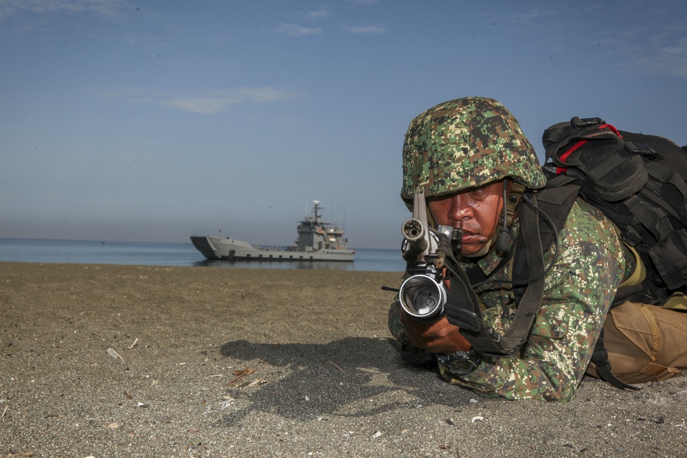 U.S. and Philippine service members participate in an amphibious capabilities demonstration during Balikatan 2016