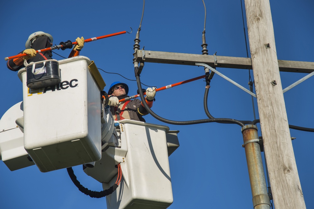 375 CES perform scheduled power outage repairs