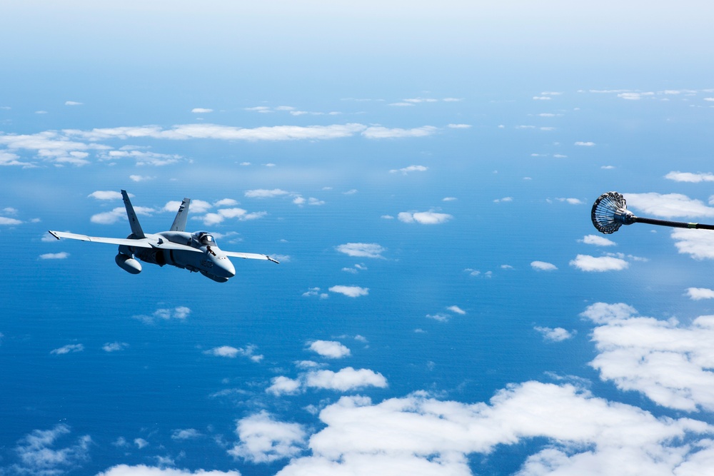 SPMAGTF-CR-AF KC-130J's and Spanish F/A-18's conduct an aerial refuel