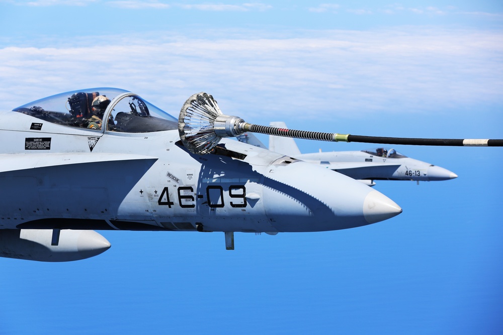 SPMAGTF-CR-AF KC-130J's and Spanish F/A-18's conduct an aerial refuel