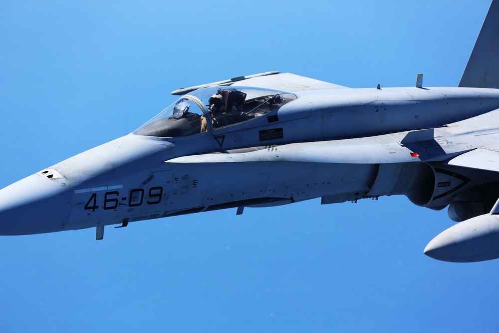 SPMAGTF-CR-AF KC-130J's and Spanish F/A-18's conduct an aerial refuel