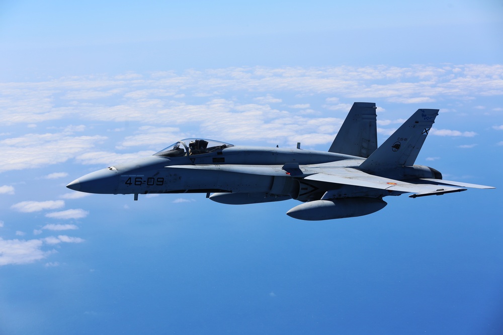 SPMAGTF-CR-AF KC-130J's and Spanish F/A-18's conduct an aerial refuel