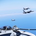 SPMAGTF-CR-AF KC-130J's and Spanish F/A-18's conduct an aerial refuel