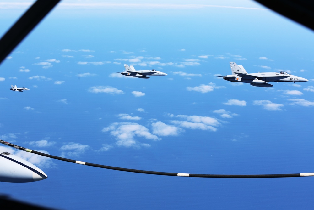 SPMAGTF-CR-AF KC-130J's and Spanish F/A-18's conduct an aerial refuel