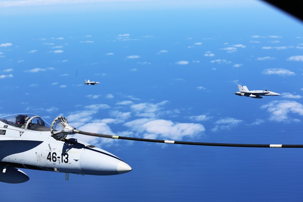 SPMAGTF-CR-AF KC-130J's and Spanish F/A-18's conduct an aerial refuel