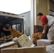 Post Office civilians distribute mail for Team Kadena