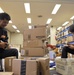 Post Office civilians distribute mail for Team Kadena