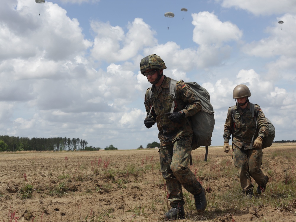 German Paratroopers walks off a drop zone