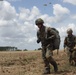 German Paratroopers walks off a drop zone