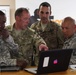 U.S. and U.K soldiers discuss photo
