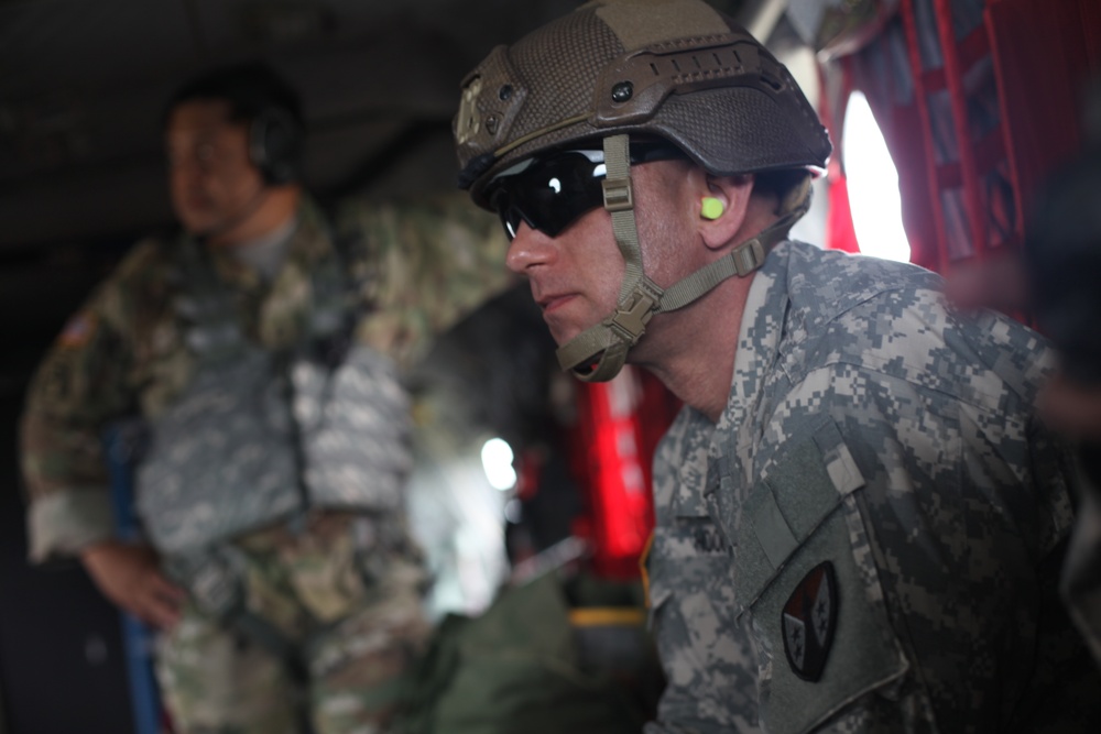 Paratroopers being observed during airborne operation.