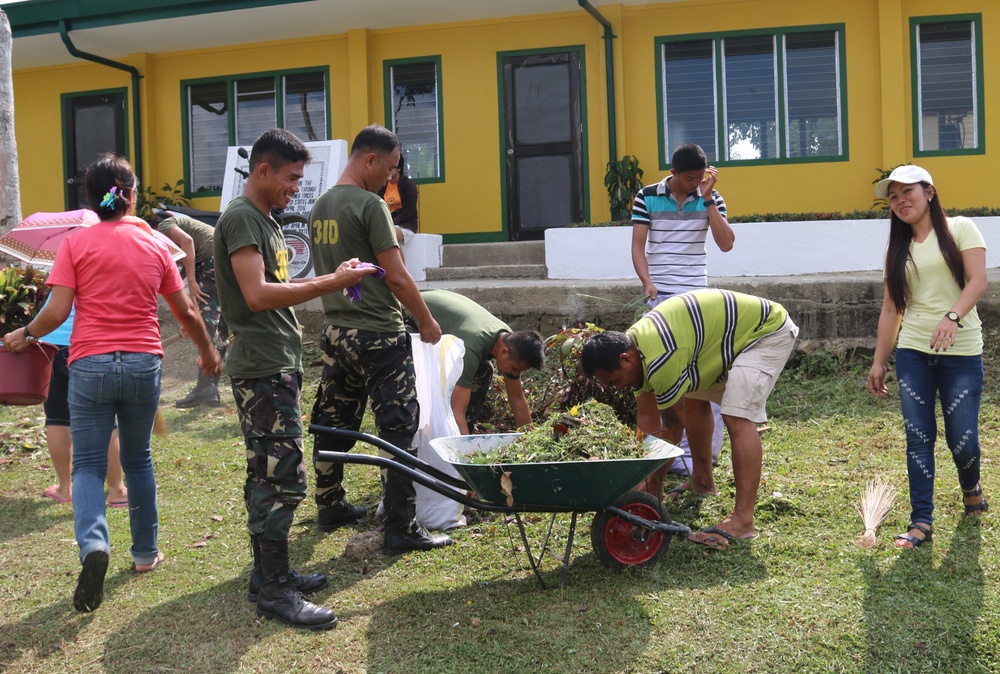 Locals and Service Members Cleanup San Nicolas Elementary School during Balikatan 2016