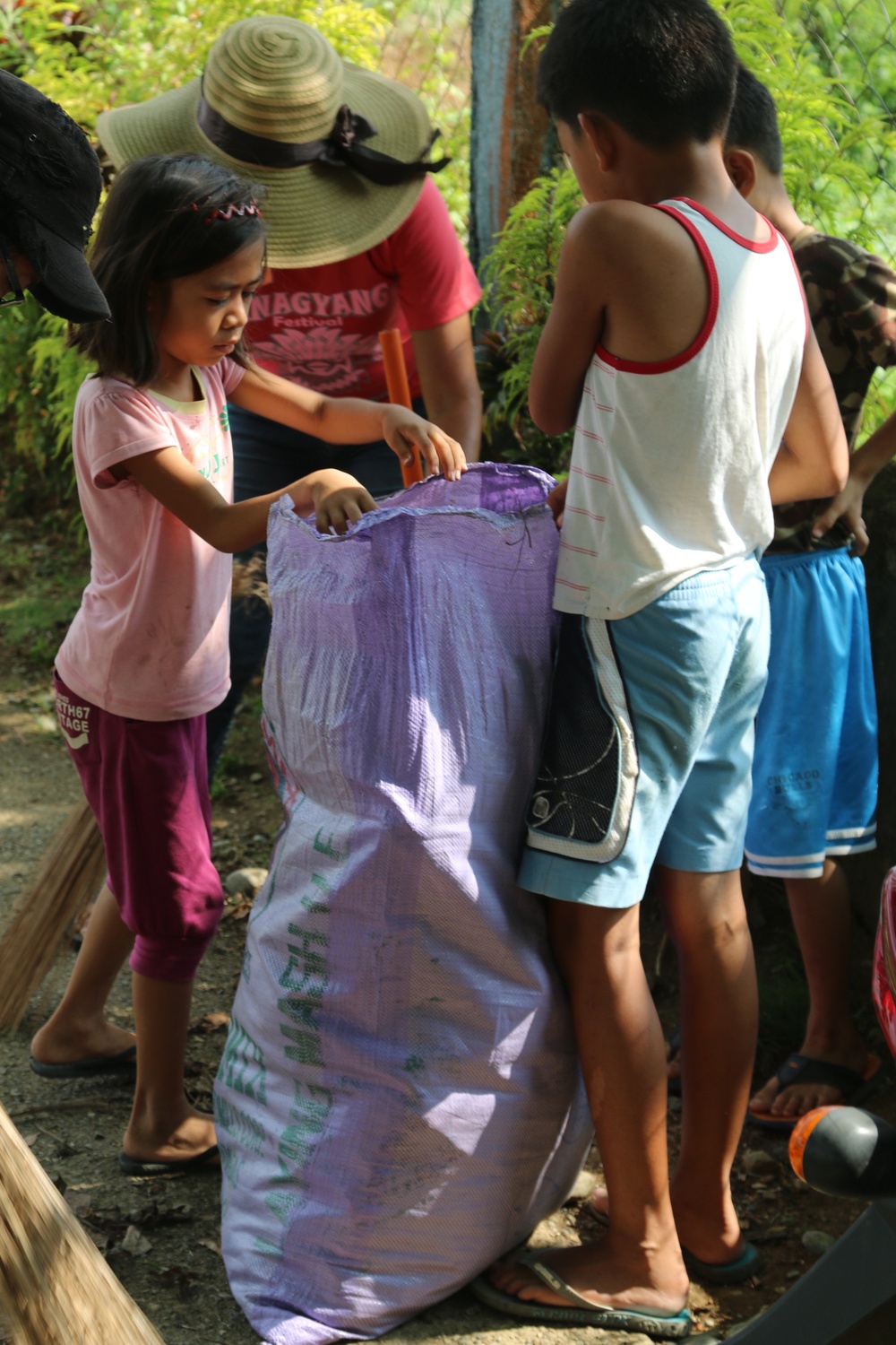 Locals and Service Members Cleanup San Nicolas Elementary School during Balikatan 2016