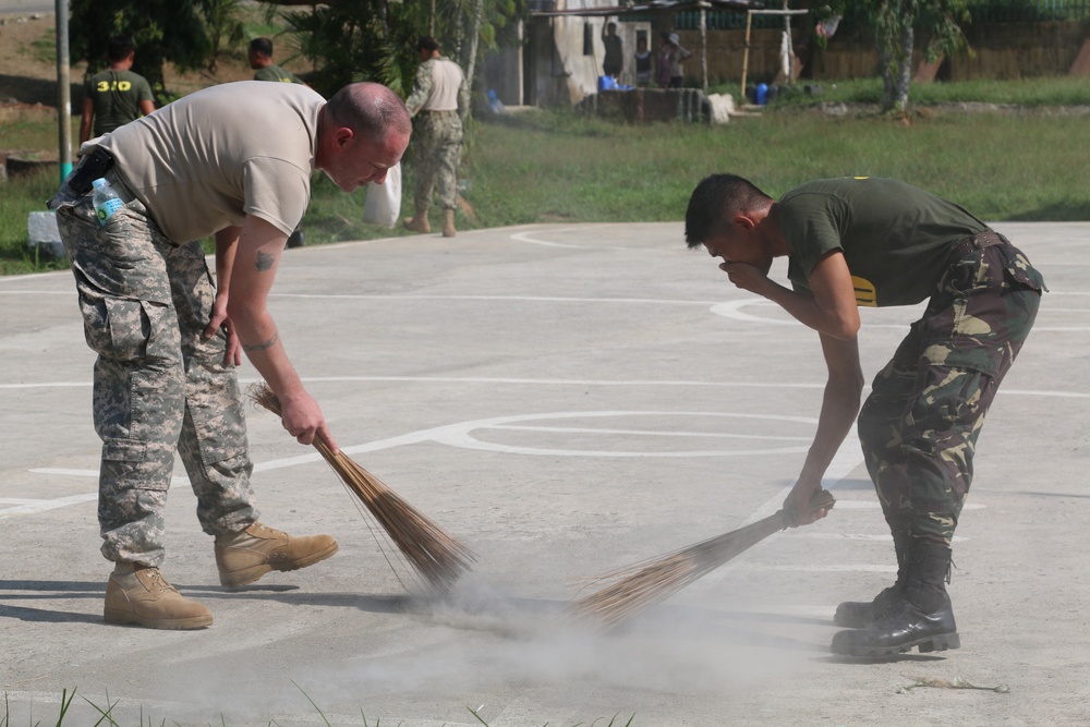 Locals and Service Members Cleanup San Nicolas Elementary School during Balikatan 2016