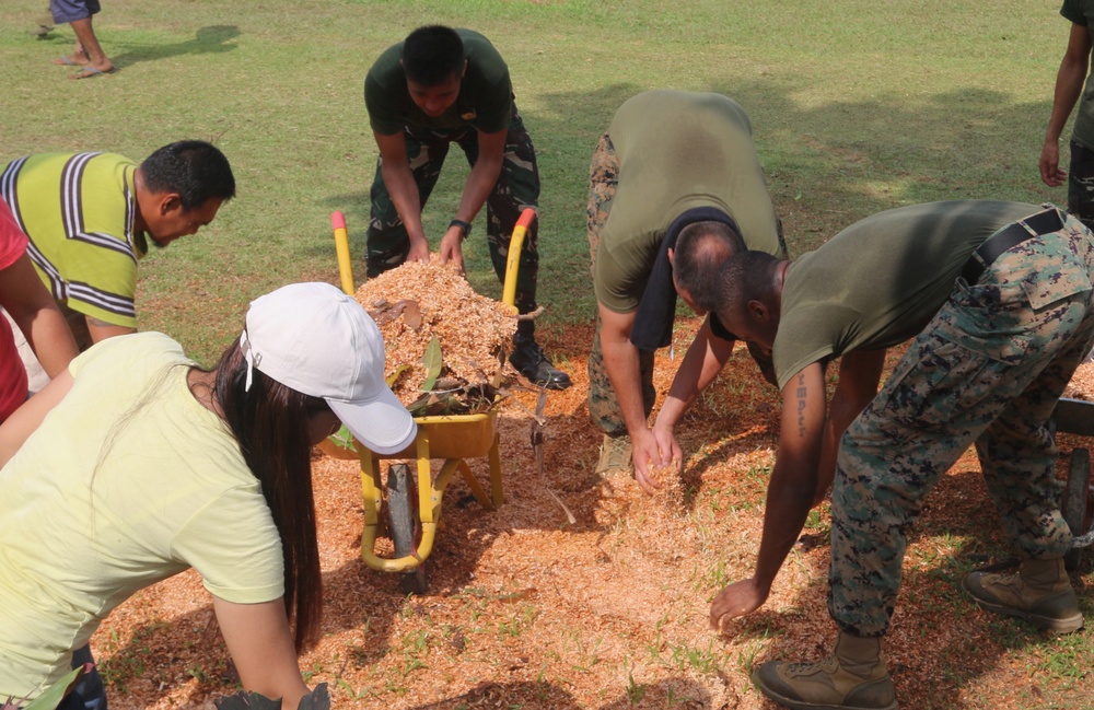 Locals and Service Members Cleanup San Nicolas Elementary School during Balikatan 2016