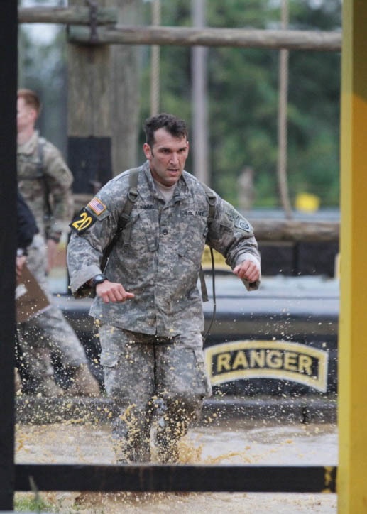 Best Ranger competitor runs towards obstacle