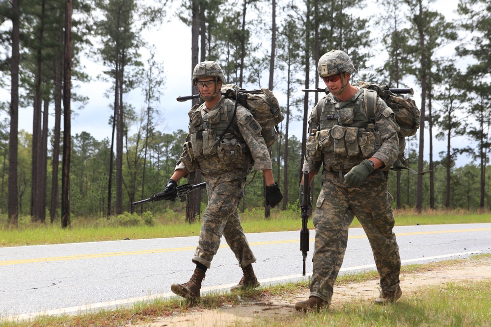 Soldiers move to the next obstacle in the Best Ranger Competition