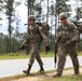 Soldiers move to the next obstacle in the Best Ranger Competition